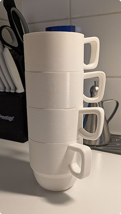 Physical stacked STRATA mug prototypes