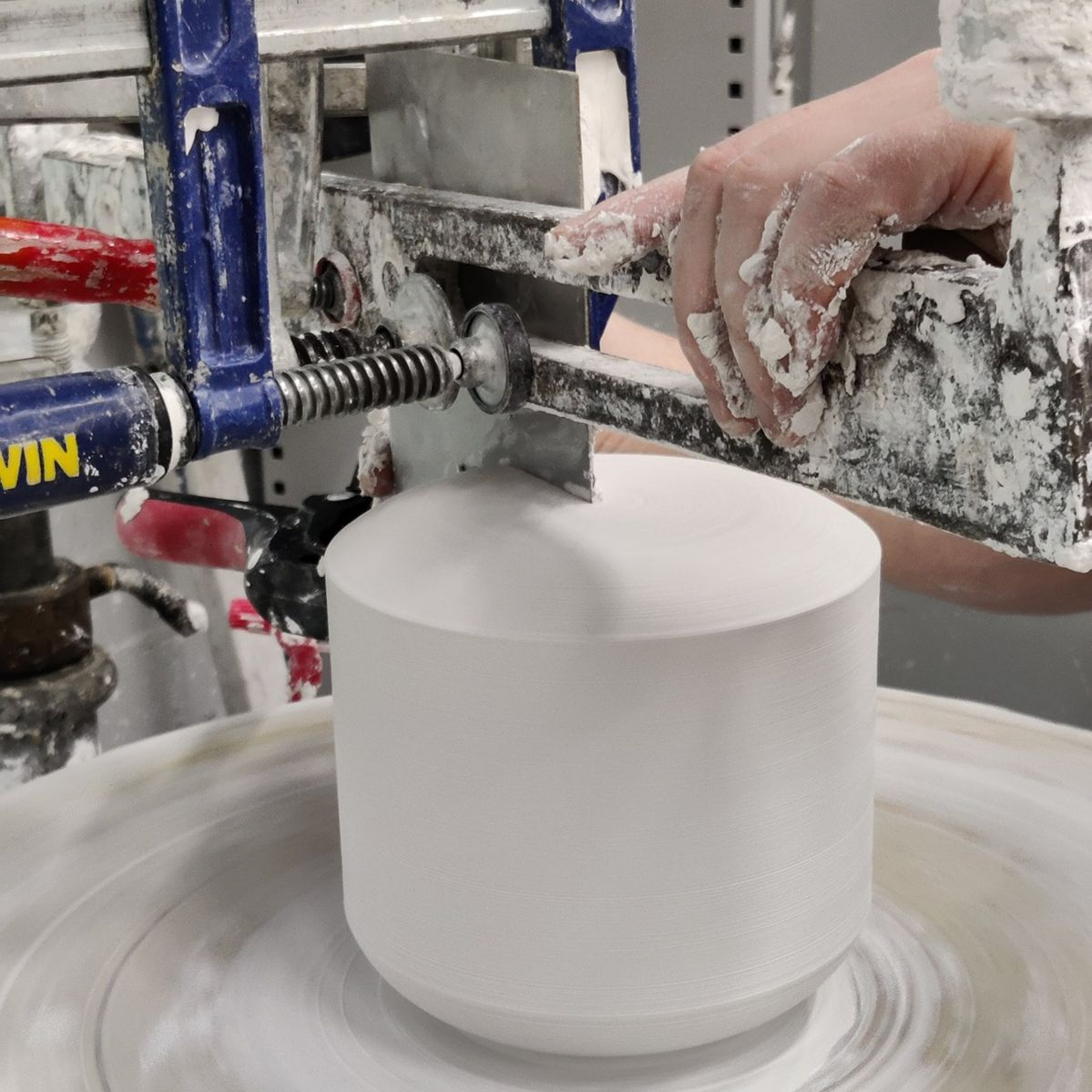 Teekannu body - plaster model turning on wheel