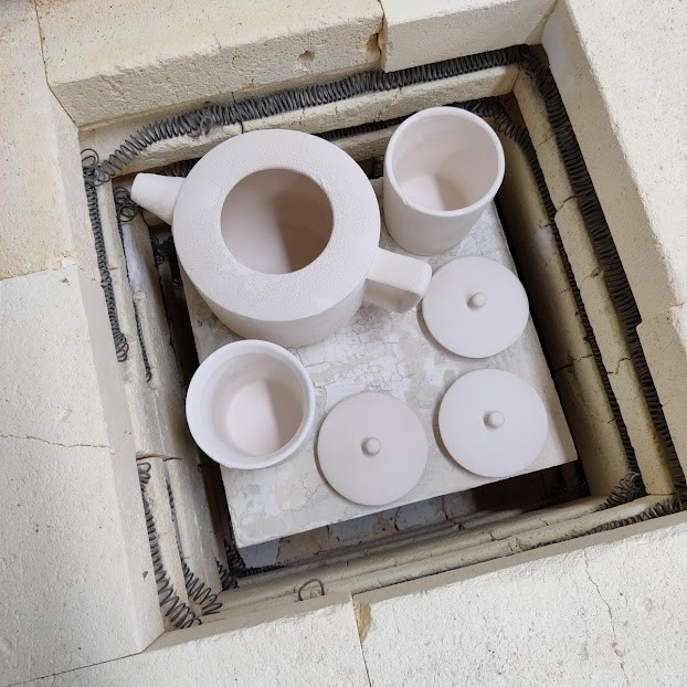 Teekannu glazing - bisque firing and swirl interior glazing
